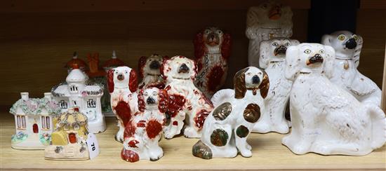 A quantity Victorian Staffordshire chimney dogs and houses